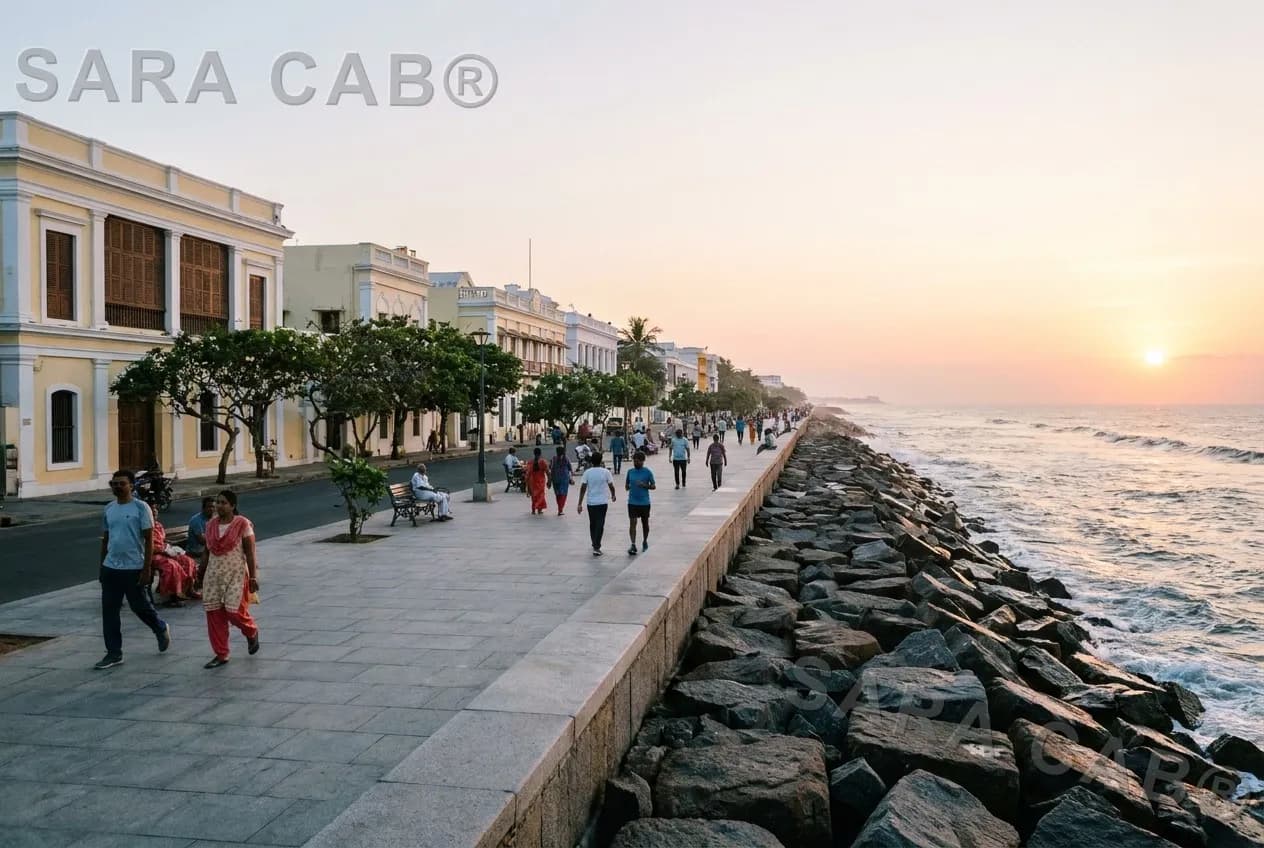 Rock Beach promenade in Pondicherry at sunrise with the boulder sea wall and colonial buildings